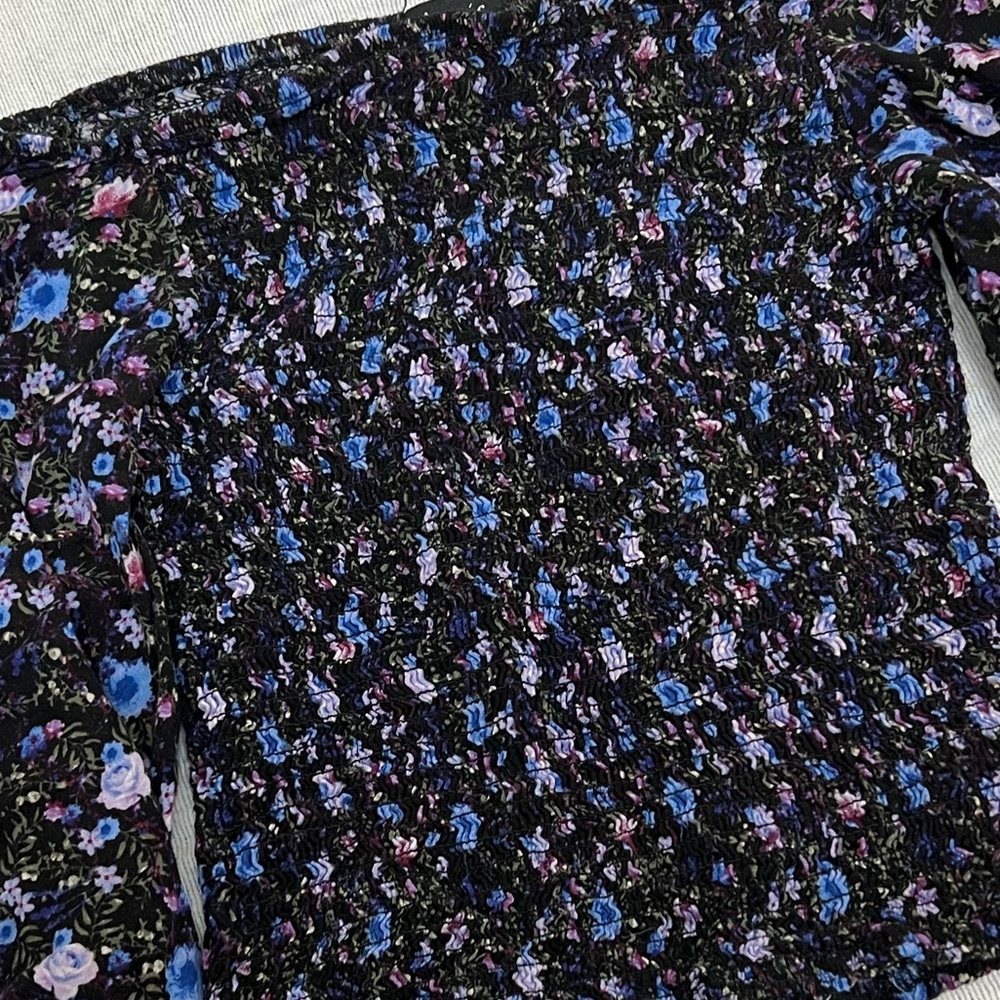 Justice smocked floral off the shoulder top.